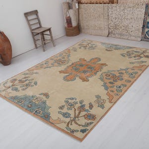 Handmade Wool Oushak Rug: 6x9 Vintage Turkish Anatolian Area Rug