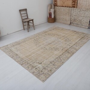 Antique Turkish Wool Rug 6x9: Handmade Anatolian Oushak Rug