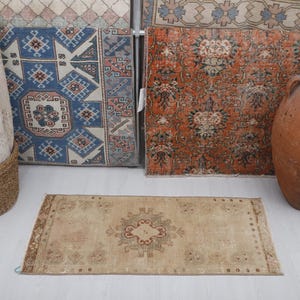 Vintage Turks Oushak-minitapijt: deurmat van 2 x 4 watten