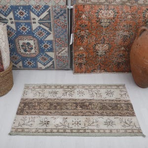 Vintage Turks Oushak-tapijt: kleine wollen deurmat van 2 x 4