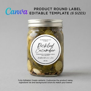 Canva editable product label template for 500ml pickle jars, featuring a customizable round design with black script text on a white background, shown as a mockup on a jar of homemade dill pickles with garlic and peppercorns.