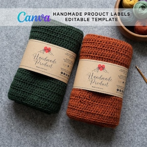 Two folded crochet scarves—one deep green and one rust-orange—each wrapped with a brown kraft paper packaging label that reads "Handmade Product." They are presented on a grey background alongside a wooden bowl of yarn and a crochet hook, with a Canva template banner overhead.