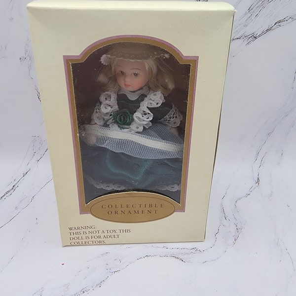 Collectible Ornament Porcelain Doll Blonde, Green Dress, Hat