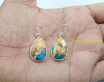 スパイニーオイスターターコイズシルバーメッキダングルイヤリング