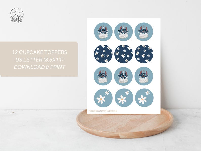 May include: Printable cupcake toppers featuring a blue and white floral design and a blue character with a crown. The text "12 CUPCAKE TOPPERS US LETTER (8.5x11) DOWNLOAD & PRINT" is at the top of the page.