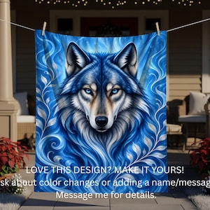 Peut inclure: Une couverture rectangulaire présentant une illustration centrale d'un loup aux yeux bleu vif, entouré de motifs floraux tourbillonnants bleus et blancs. Le texte indique : LOVE THIS DESIGN? MAKE IT YOURS! Ask about color changes or adding a name/message. Message me for details.