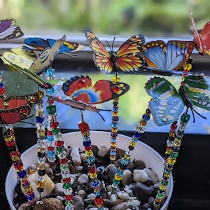 Set of 5 Beaded garden stakesButterfly embellished with glass beads ornaments for your plants, waterproof on a 10&quot;  stake. Indoor/outdoor