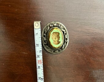 Green acrylic and glass inverted cameo pin