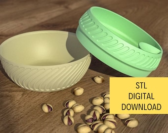 May include: Two 3D printed bowls, one green and one yellow, with a textured swirl design. The bowls are on a wooden surface with pistachio nuts scattered around them. The text "STL DIGITAL DOWNLOAD" is on a yellow rectangle.