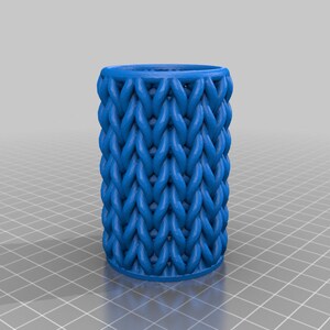 May include: A blue 3D printed cylindrical container with a woven pattern.