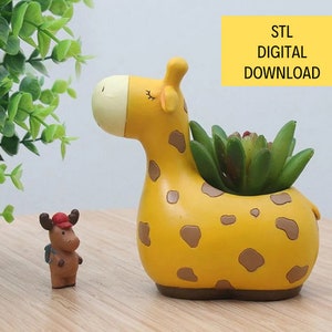 May include: A yellow giraffe planter with brown spots and a green succulent plant inside. The planter is made of ceramic and has a cute cartoon giraffe face. STL DIGITAL DOWNLOAD is written in yellow text on a white background.