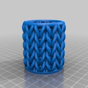 May include: A blue woven plastic ring holder. The holder is made of a woven pattern that resembles a basket.