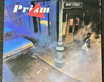 Set of 2 Vintage Prism Vinyl Records