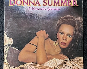Assorted Donna Summers Vinyl Records