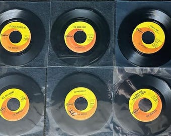 Assorted Vintage 7" Records of The Beatles