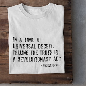 In A Time Of Universal Deceit, Telling The Truth Is A Revolutionary Act, George Orwell Unisex T-Shirt, Conspiracy Theories Shirt, 1984 Shirt