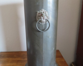 Midcentury Brass and Lion Head Umbrella Stand, measures 22 inches tall, heavy and big.  Good vintage condition.
