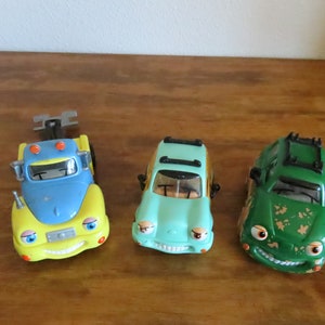 Chevron Cars CHOOSE 1- NO 16 Woody Wagon- no surfboard, Trevor Tow Truck, Freddy Four Wheeler