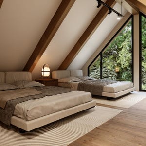 A cozy loft with an open layout, featuring a plush bed, a small living /flexible space for work or relaxation. Warm wood tones, soft lighting, and airy design create a tranquil hideaway, perfect for unwinding while overlooking the main living space.