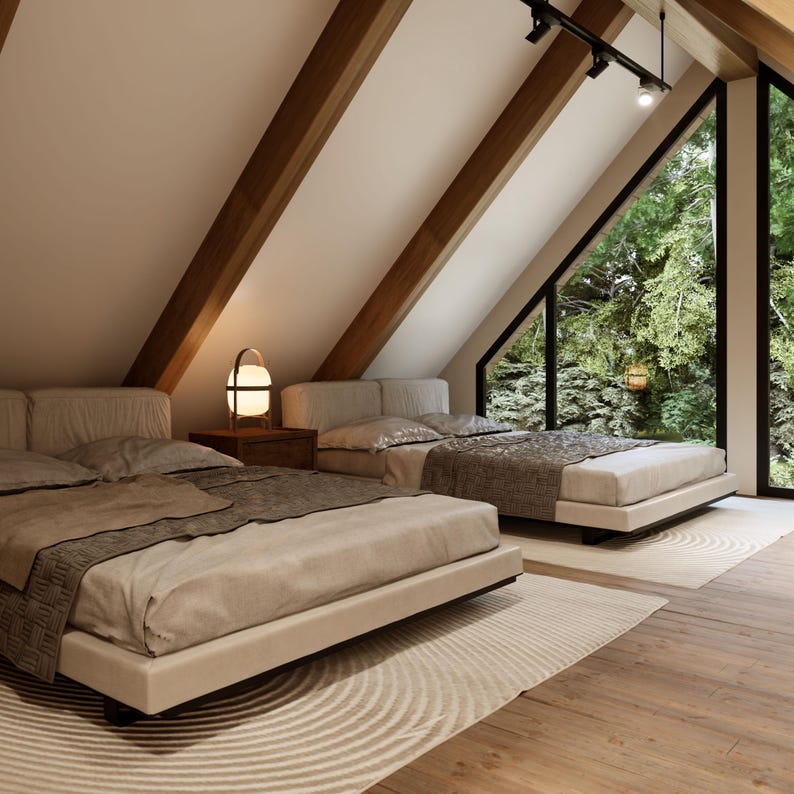 A cozy loft with an open layout, featuring a plush bed, a small living /flexible space for work or relaxation. Warm wood tones, soft lighting, and airy design create a tranquil hideaway, perfect for unwinding while overlooking the main living space.