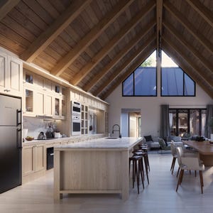 A modern kitchen blending natural wood, sleek cabinetry, and warm lighting. A spacious marble countertop anchors the space, paired with minimalist open shelving, elegant brass fixtures, and seamless storage.