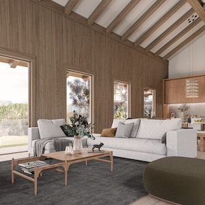 the living spaces are divided into living room and dining room, construction with wooden structure,high ceilings in the barn, cabin with living room,wooden kitchen,hanging lamps in kitchen, coffee table,windows in the entire wall,wooden dining room