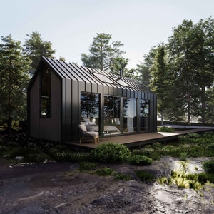 Side view of a cabin with expansive sliding glass doors, and a large side window above the kitchenette. The design allows ample natural light, blending indoor and outdoor spaces for a harmonious, nature-inspired modern cabin ambiance.