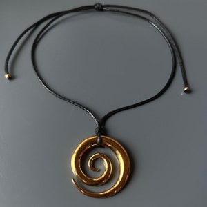 Stainless steel gold spiral/swirl pendant charm choker necklace on black cord / minimalist y2k retro boho indie grunge handmade gold jewelry