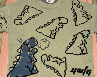 Pull en tricot vert dinosaure dessin animé Eden Aelfric