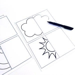 Puede incluir: Hojas de papel blanco con contornos negros de una nube y un sol, junto con un rotulador negro. Las hojas están dispuestas sobre una superficie blanca, lo que sugiere una actividad de dibujo o coloreado. Las imágenes son sencillas y adecuadas para niños.