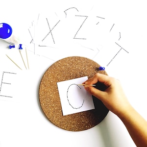 Alphabet Pin Poking Activity and Fine Motor Skills