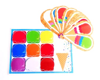 May include: A set of colorful ice cream cone shaped cards with a matching set of ice cream scoops in various colors. The cards are arranged in a fan shape and the scoops are arranged in a grid.