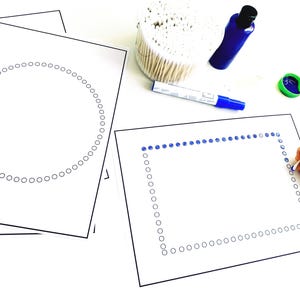 May include: Two sheets of paper with circles printed on them. One sheet has a circle of circles, the other has a square of circles. A hand is using a cotton swab to paint the circles blue.