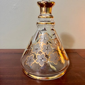 Mid century modern 1960’s decanter with glass stopper and hand painted gold flowers