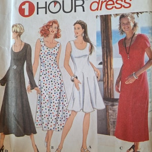 May include: A sewing pattern envelope titled 1 HOUR dress featuring illustrations of four variations of a dress. The designs include a long-sleeved black dress, a sleeveless white dress with colourful polka dots, a sleeveless white dress, and a red dress.