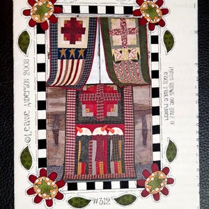 May include: A pattern booklet titled "The Whole Country Caboodle" featuring three table runner designs. The cover displays colorful patchwork designs with red, blue, and green accents. The text "The Runners Three" and "Patterns Includes Instructions for 3 Table Runners" are also visible.