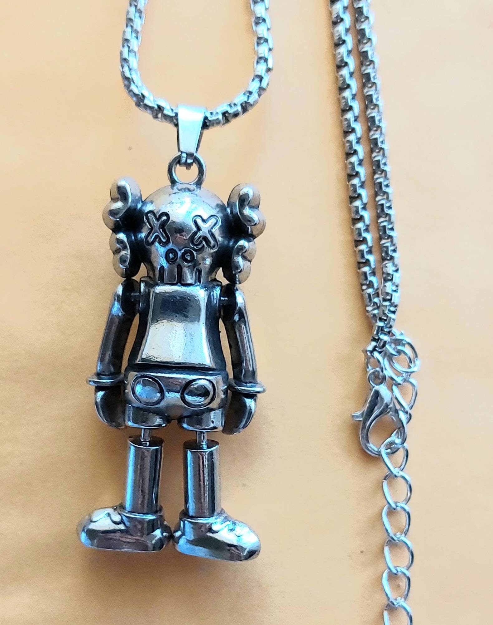 Kaws chain pendant deals