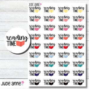 May include: Sheet of stickers with the text "reading time" and small illustrations of open books in various colors. The stickers are arranged in rows and columns on a white background. The brand name "Jude Anne" is also visible.