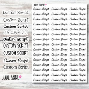 May include: A sheet of white stickers with the words "Custom Script" in various fonts and styles. The stickers are in black ink. The name "Jude Anne" is also printed on the sheet.