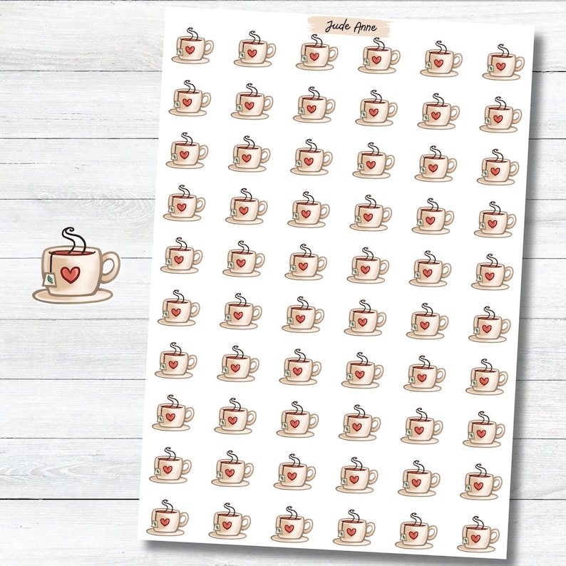 May include: A sheet of 49 stickers featuring a cartoon illustration of a teacup with a heart and a tea bag. The teacup is beige with a red heart and a brown tea bag. The teacup has a brown handle and a brown steam coming from the top.