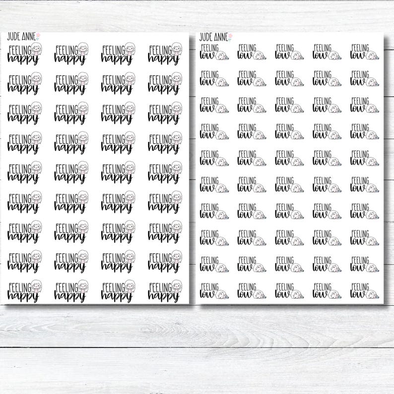 May include: Two sheets of stickers with the words "Feeling Happy" and "Feeling Low" in black script. Each sticker has a smiling face. The stickers are arranged in rows and columns on a white background.