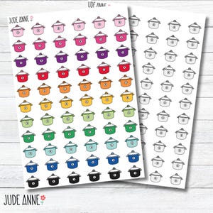 May include: A sheet of colorful pot stickers with a sheet of black and white pot stickers. The colorful stickers are arranged in a rainbow pattern.