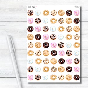 May include: A sheet of 48 donut and cookie stickers. The stickers feature a variety of donuts with different toppings, including chocolate, sprinkles, and glaze. There are also several cookie stickers with different designs. The stickers are all on a white background.