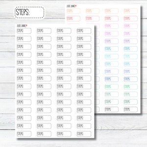 May include: A sheet of printable planner stickers with the word "STEPS" in a handwritten font. The stickers are in various colors, including orange, pink, purple, blue, and green. The stickers are designed to be used in a planner or journal.