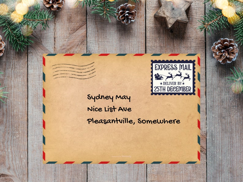 May include: A brown envelope with a red and blue border. The envelope has a handwritten address that reads "Sydney May, Nice List Ave, Pleasantville, Somewhere". The envelope also has a red and blue stamp that reads "EXPRESS MAIL * DELIVER BY 25TH DECEMBER".