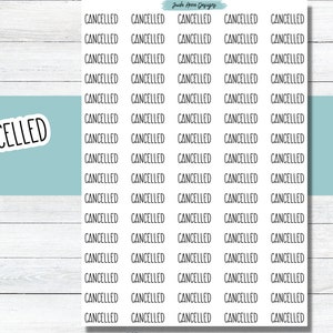 May include: A sheet of stickers with the word "CANCELLED" repeated multiple times in black text on a white background.