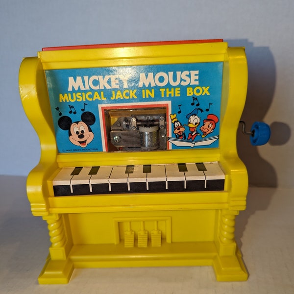 Vintage Kohner Bros, Inc musical piano Jack-in-the-Box.  Plays "This Old Man," tested and works.  Mickey pops up, couple of scratches.