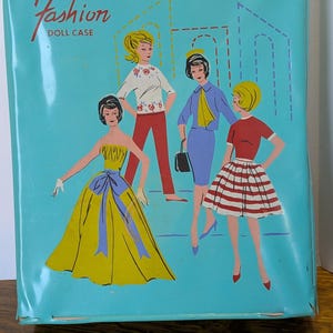 Vtg fashion doll case, great color.  Room for one doll and clothes.  Damage to case as seen in pictures. 10 x 12.25 x 2.5