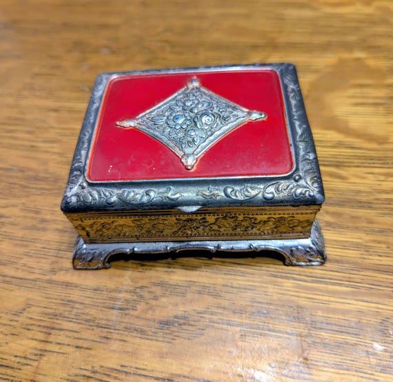Vintage footed metal trinket/jewelry box, made in occupied Japan....