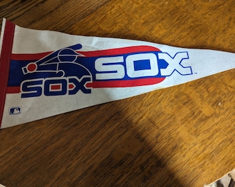 Vintage MLB Chicago White Sox felt pennant with small stains visible as seen in photo